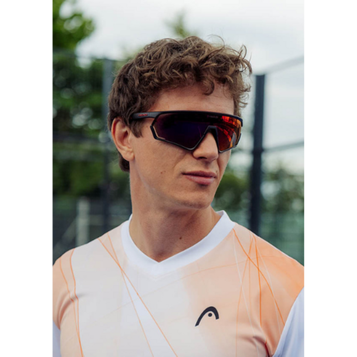 man wearing HEAD performance sunglasses